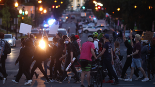 Man Who Sheltered 70 DC Protesters Says Police Tried to Pepper Spray Through His Windows